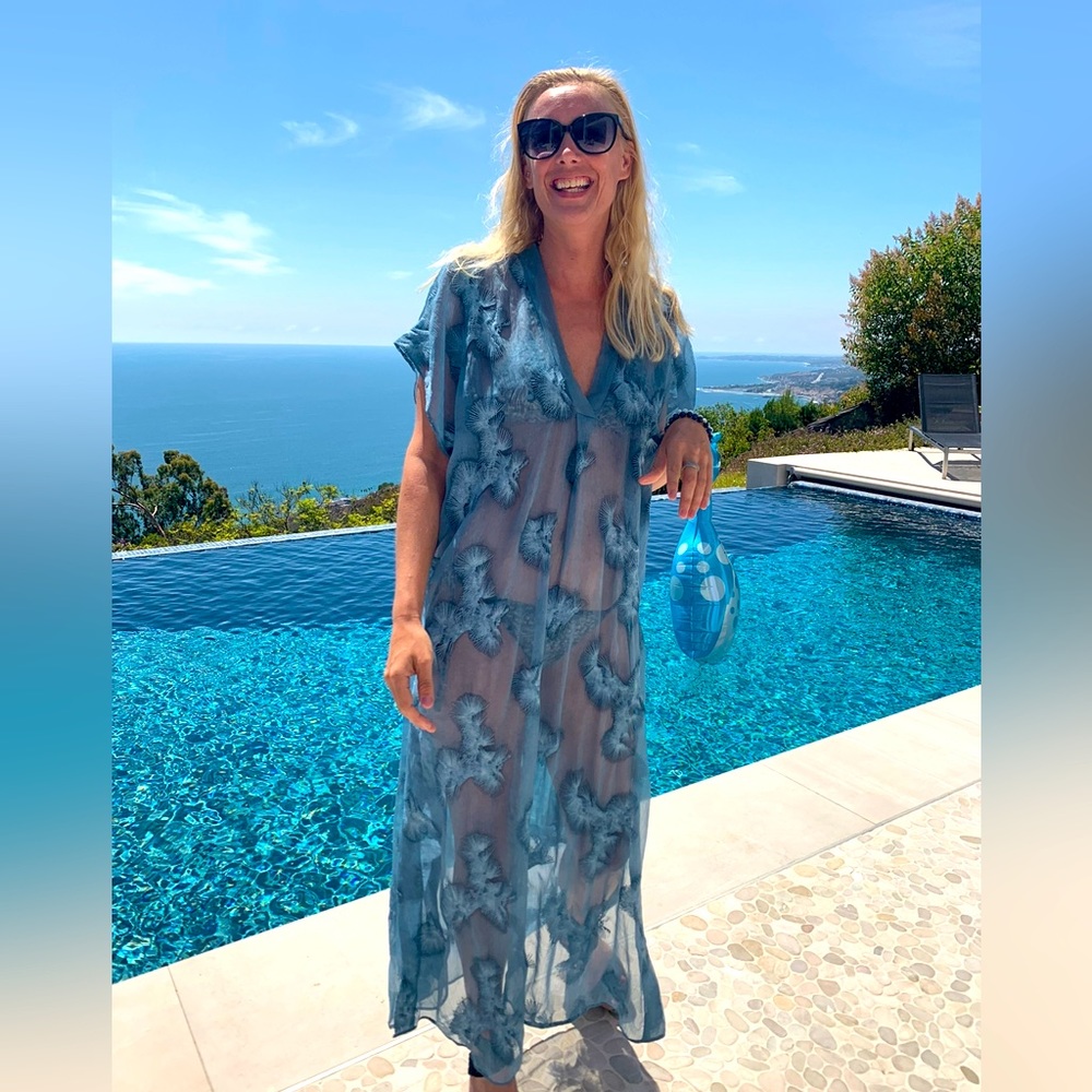 Semi see through maxi dress. Perfect for a pool party! The color is amazing!!
